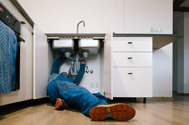 Professional Plumbing technician working in Ozone Park, NY